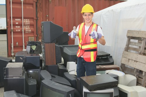 Homeowner decluttering storage items in a garage